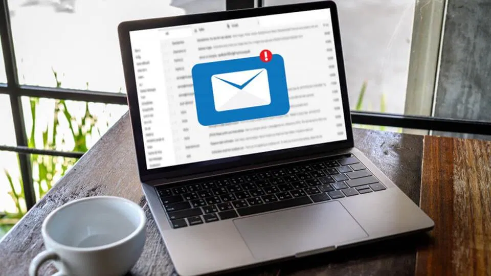 A laptop displaying expert methods to grow your email list on the screen.