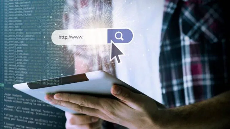 man using a tablet with a digital concept of internet search depicted by an illustrated search bar and cursor, showcasing the best online marketing tools.