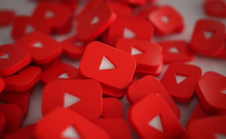 a scattered array of youtube play button logos, paints a vivid blueprint of success waiting to be explored.