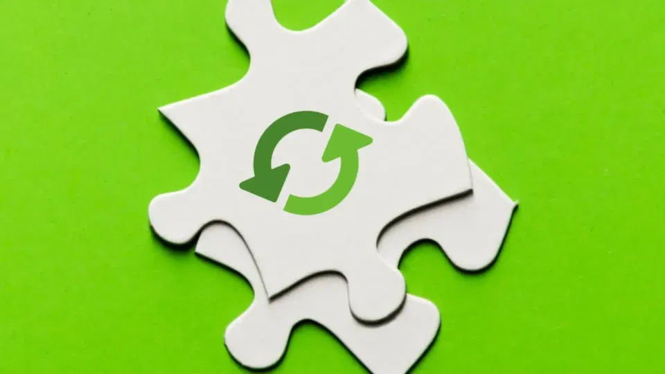 a white puzzle piece with a green circular arrow symbol is placed on a bright green background, representing strategies for sustainable income.