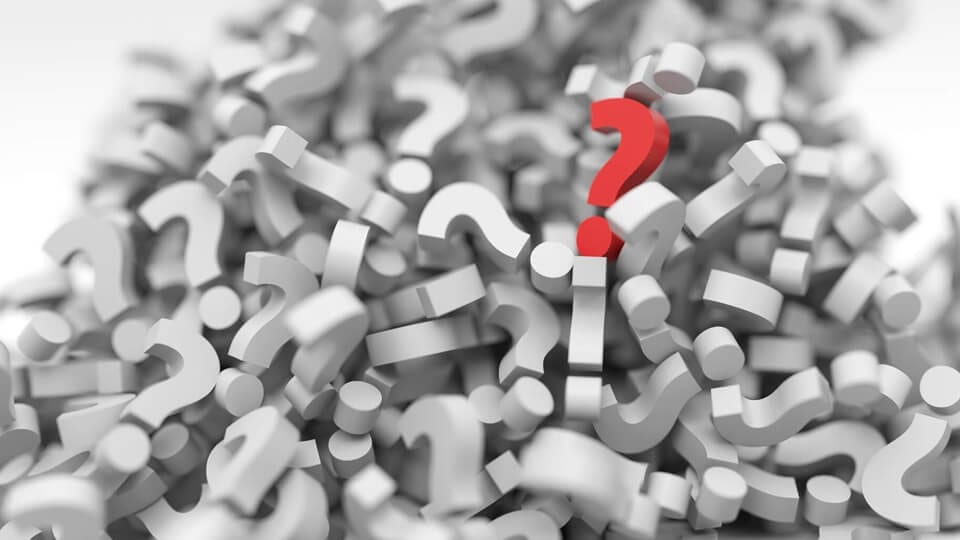 A pile of white and red question marks, evoking myths around affiliate marketing.